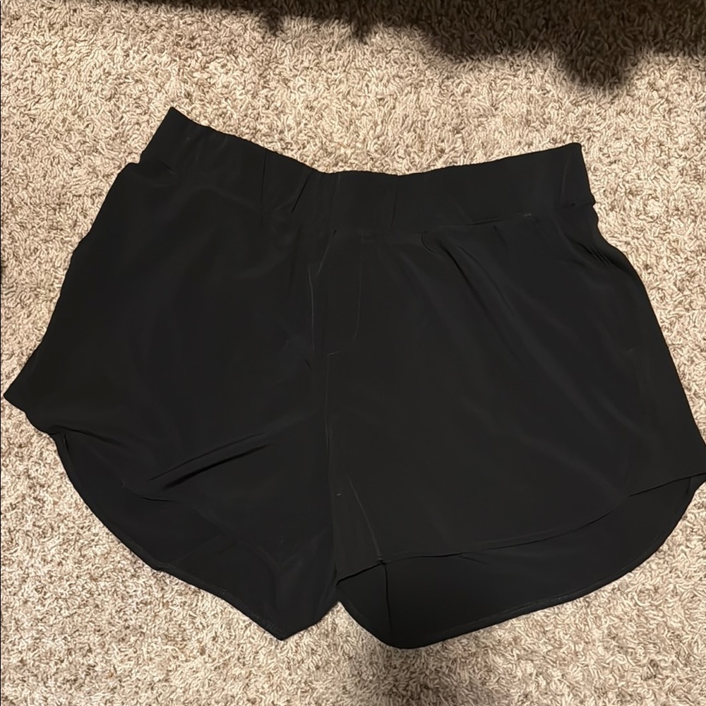 Black Athletic Shorts with Curved Hem and Elastic Waistband